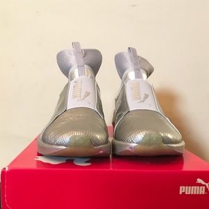 Silver Puma sneakers